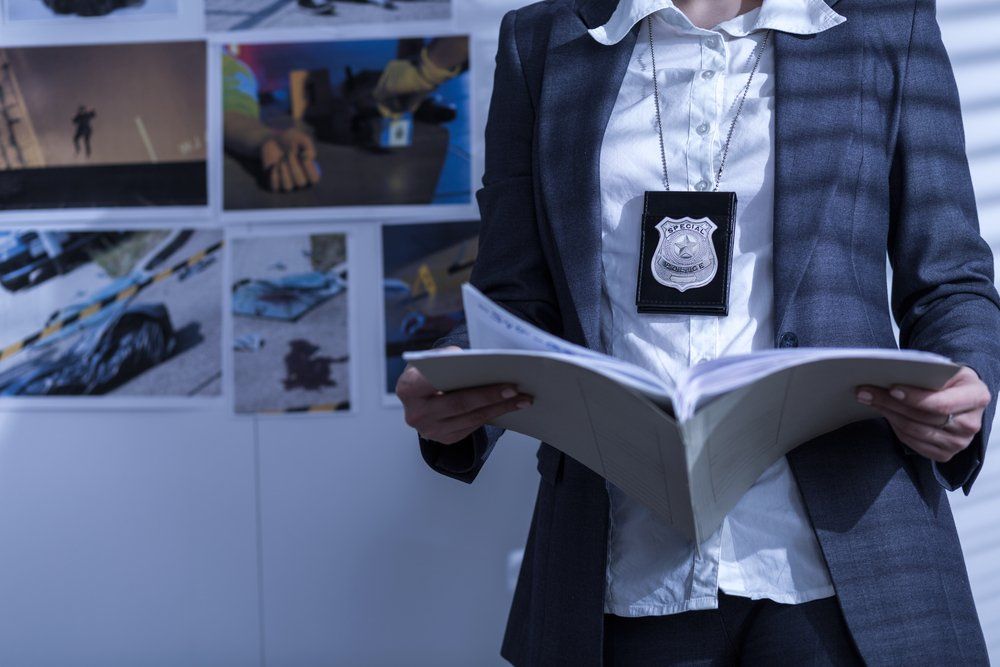 police woman looking at documents 