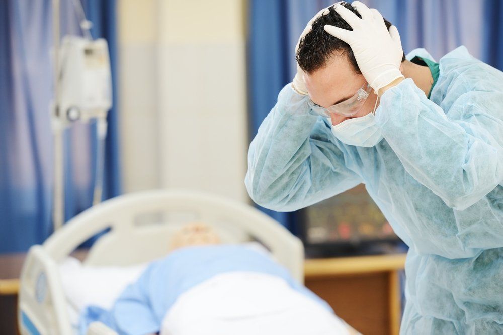 doctor upset over the loss of a patient