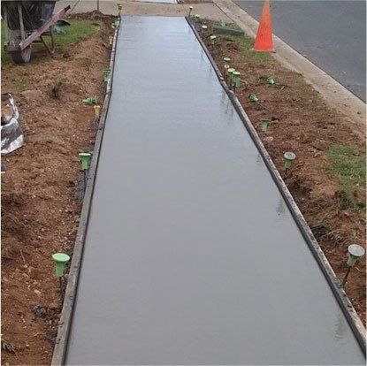 after concrete sidewalk