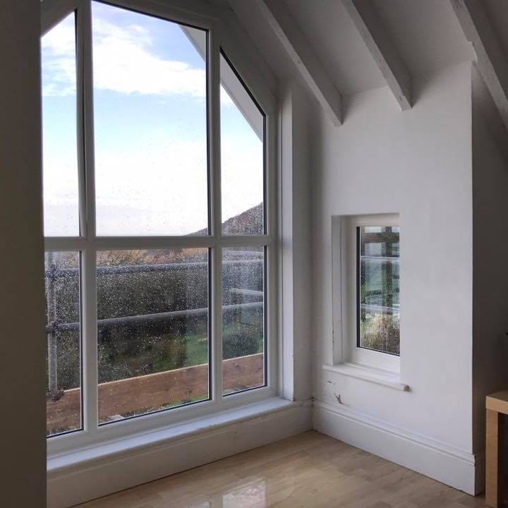 Double glazed window fitting
