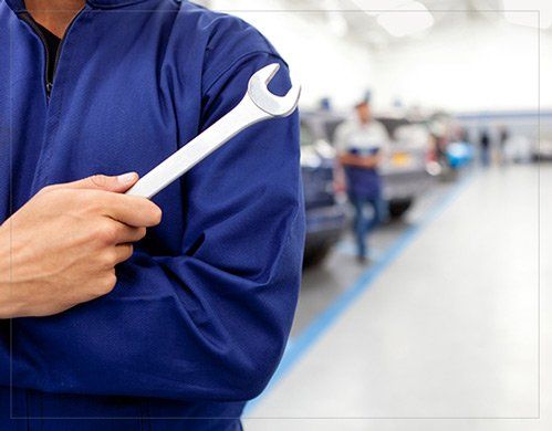 Mechanic with a wrench - Auto Care in Gorham,ME