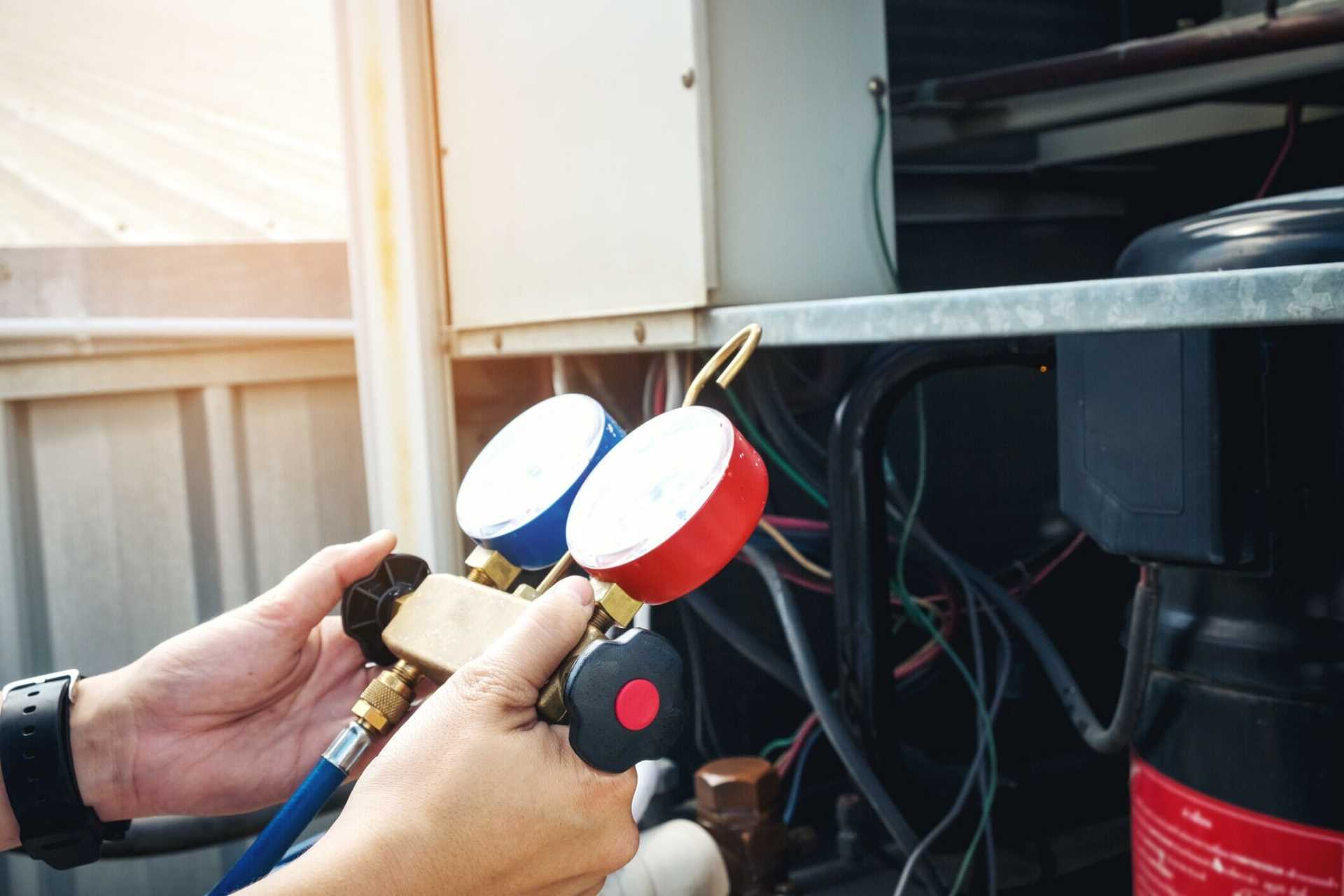 Technician checking paperwork — Heating & Air Conditioning Repair in Twin Falls ID