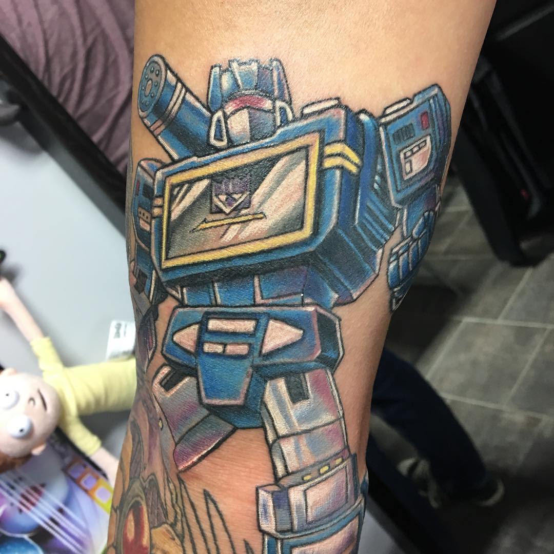 Optimus Prime Transformers Tattoo by Chris Labrenz at Black Gold Tattoo Co in Edmonton Alberta Canada