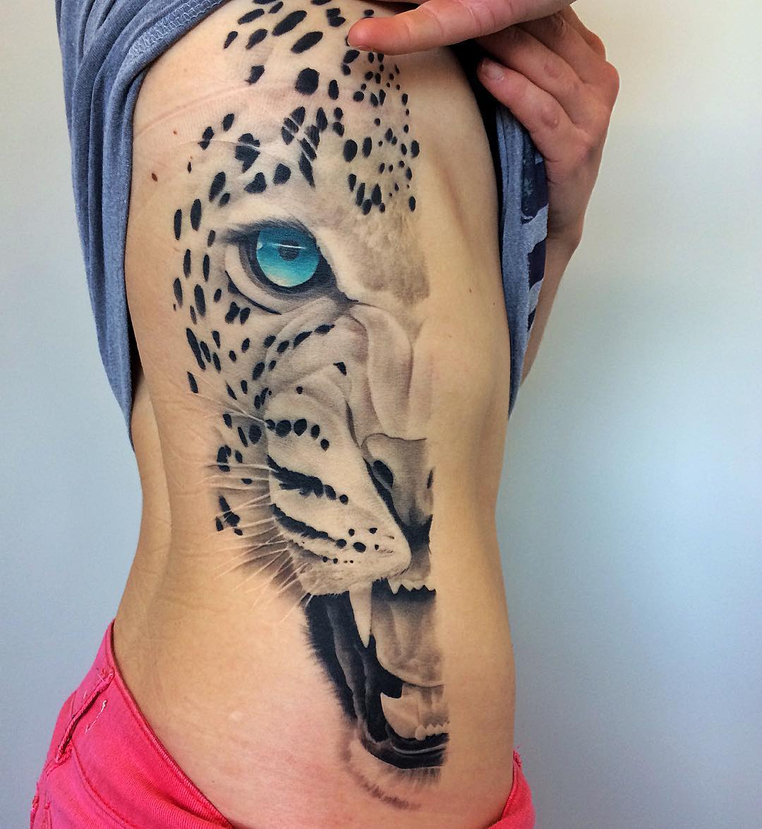 Snow Leopard Tattoo by Chad Lavers at Crimson Empire Tattoo in Edmonton Alberta Canada