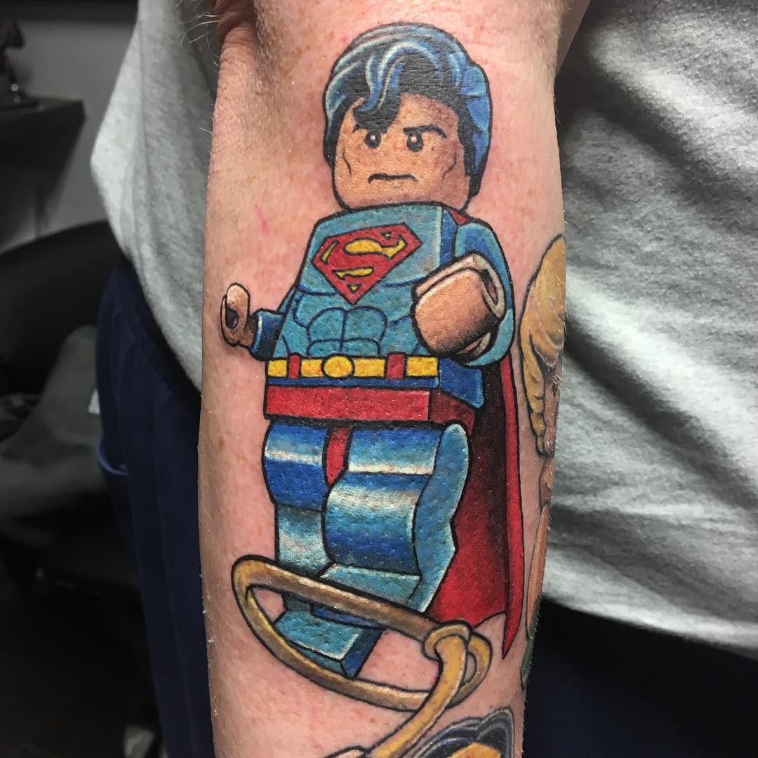 Lego Superman Tattoo by Chris Labrenz at Black Gold Tattoo Co in Edmonton Alberta Canada