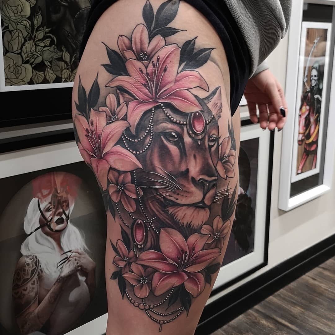 Lioness Jewelry and Flowers Tattoo by Sasha Day at Black Gold Tattoo Co in Edmonton Alberta Canada