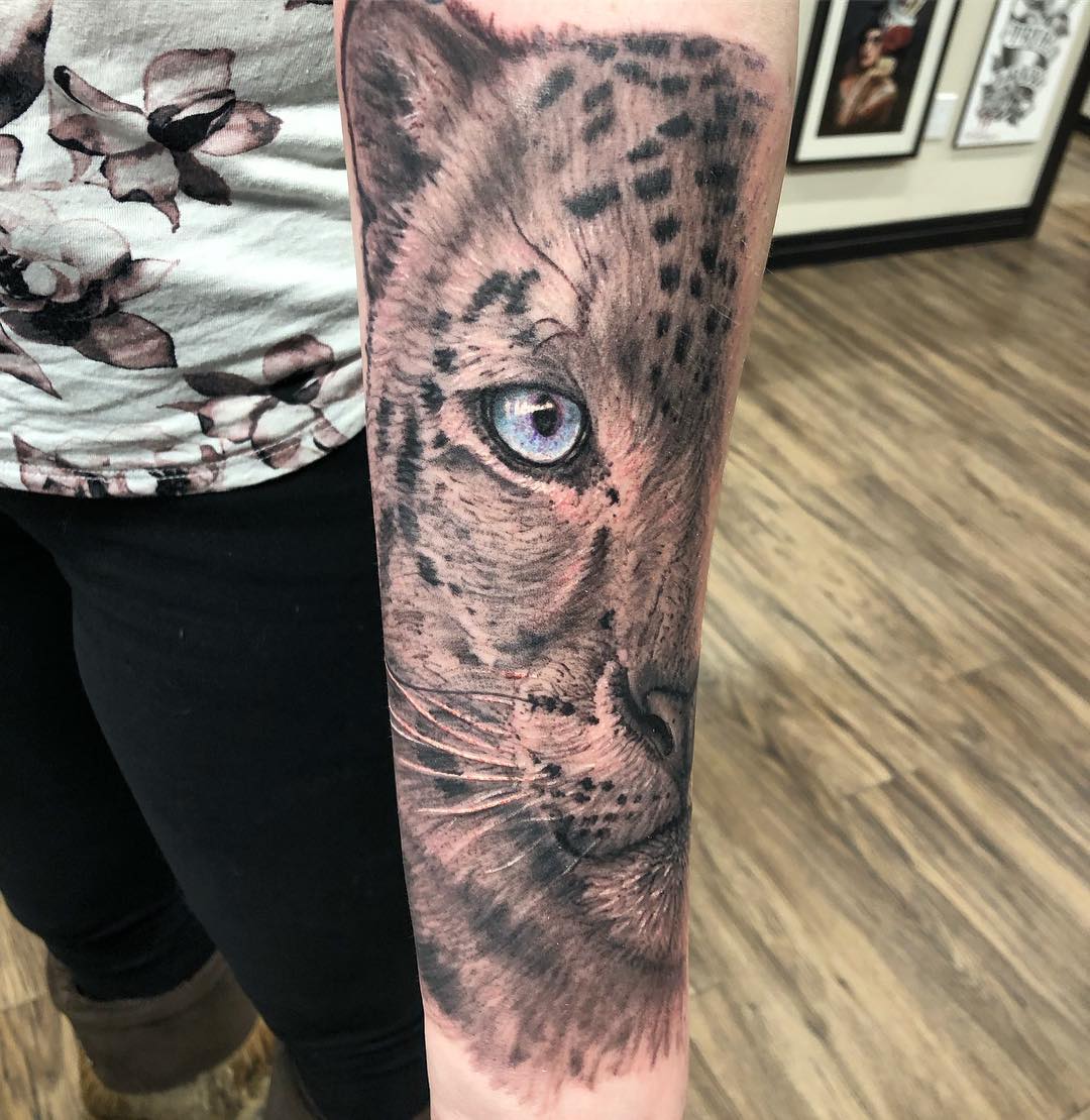 Snow Leopard Tattoo by Steve Hayes at Black Gold Tattoo Co in Edmonton Alberta Canada