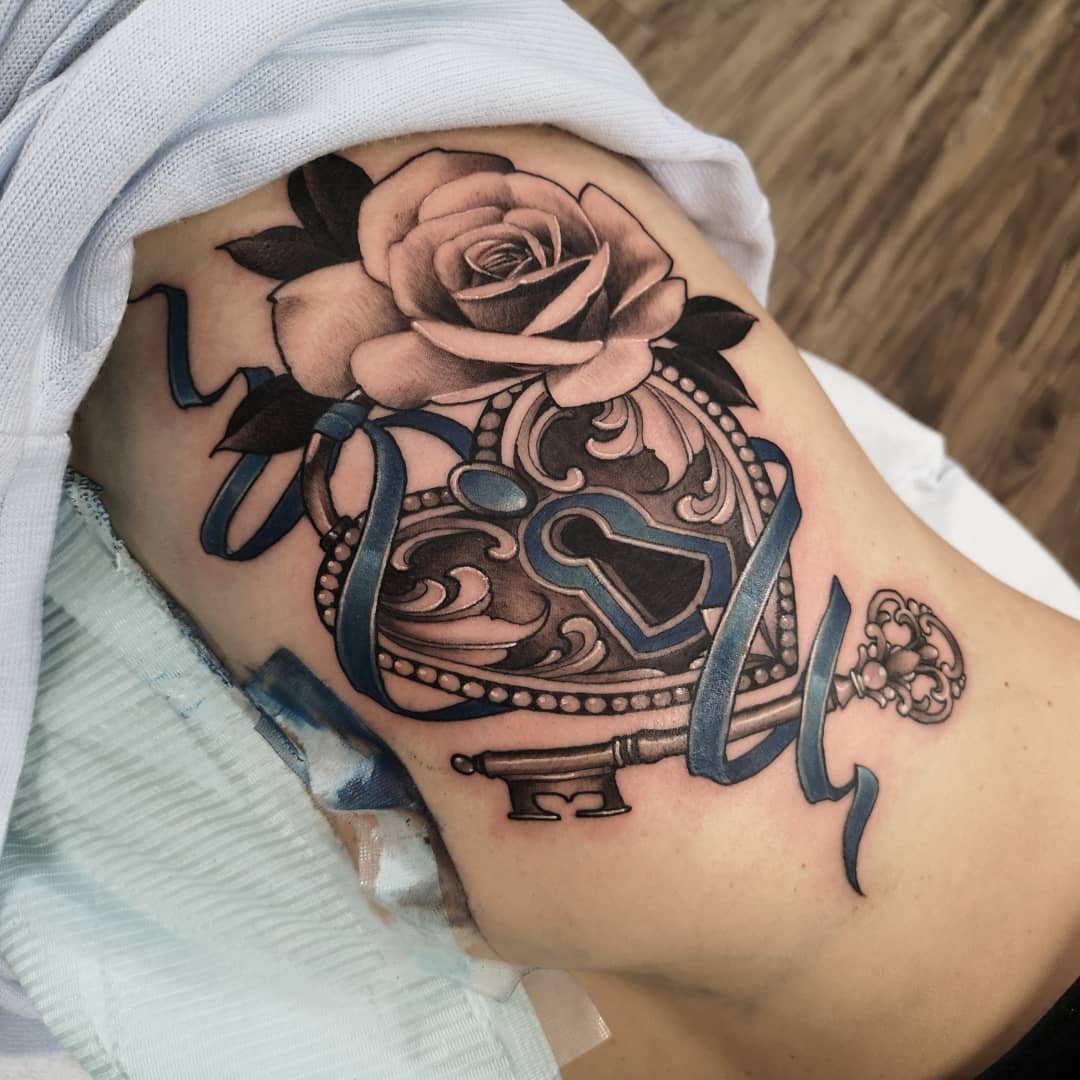 Heart Locket and Rose Tattoo by Sasha Day at Black Gold Tattoo Co in Edmonton Alberta Canada