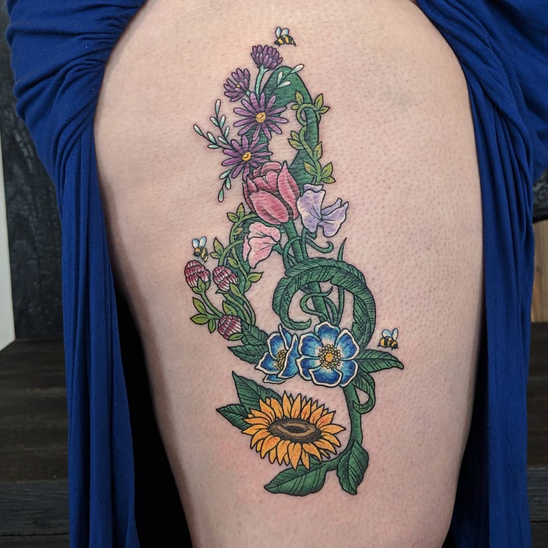 Treble Clef and Floral Tattoo by Sheila Anderson at Crimson Empire Tattoo in Edmonton Alberta Canada