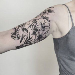 Floral Bird Half Sleeve Tattoo by Adrienne Alexander at Crimson Empire Tattoo in Edmonton Alberta Canada