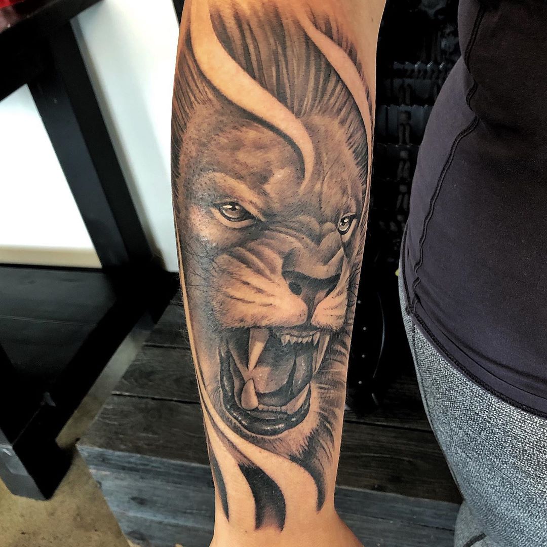 Lion Tattoo by Chad Lavers at Crimson Empire Tattoo in Edmonton Alberta Canada