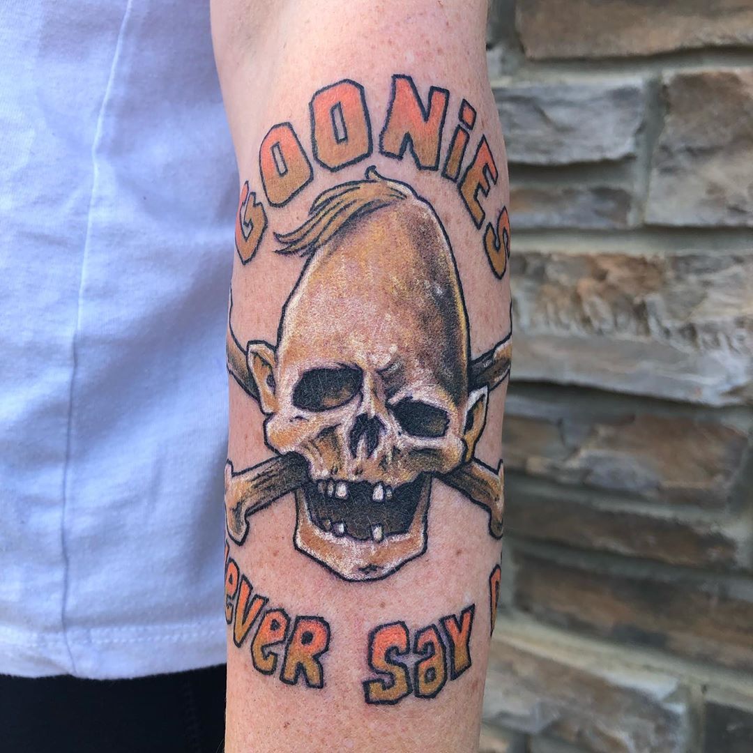 Goonies Sloth Skull and Crossbones Tattoo by Chris Labrenz at Black Gold Tattoo Co in Edmonton Alberta Canada