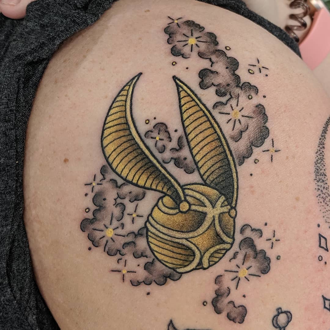 Golden Snitch (Harry Potter) Tattoo by Sheila Anderson at Crimson Empire Tattoo in Edmonton Alberta Canada