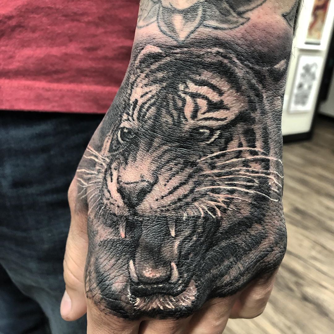 Tiger Hand Tattoo by Steve Hayes at Black Gold Tattoo Co in Edmonton Alberta Canada