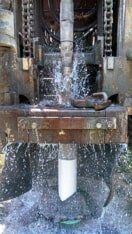 truck performing Well Drilling with a lot of water in Brandy Station, VA - Riner Well Drilling