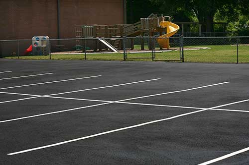 Commercial Paving — School Parking Lot in Colorado Springs, CO Commercial Paving — School Parking Lot in Colorado Springs, CO