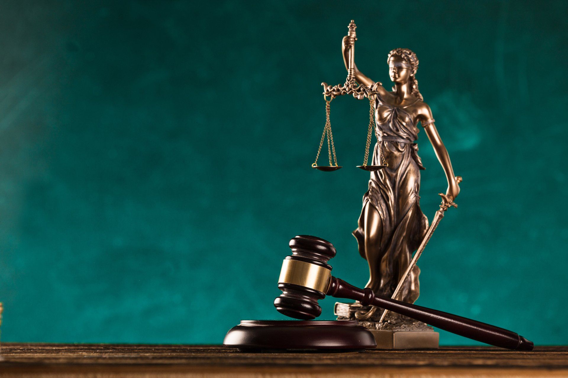 A gavel and justice statue — Chicago, IL — LBI Law LLC