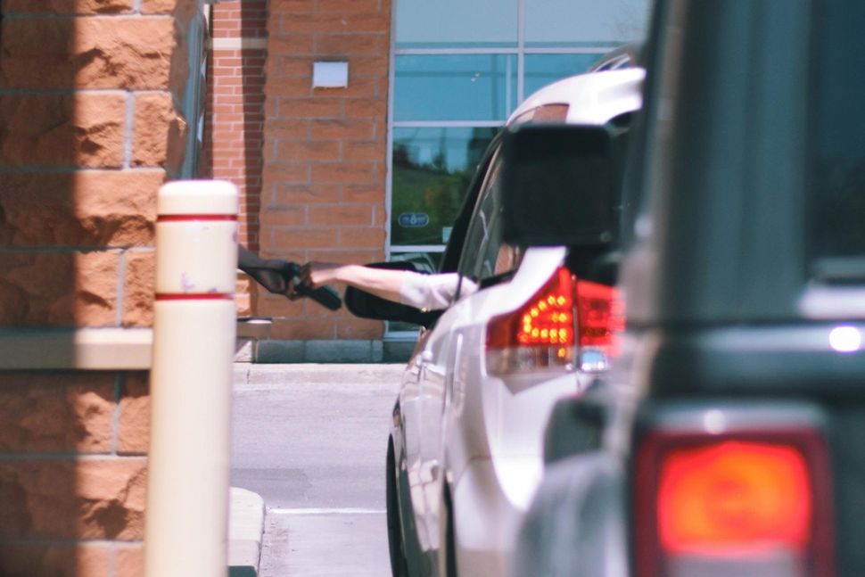 Cars lined up at drive thru window