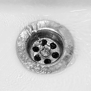 Drain with water
