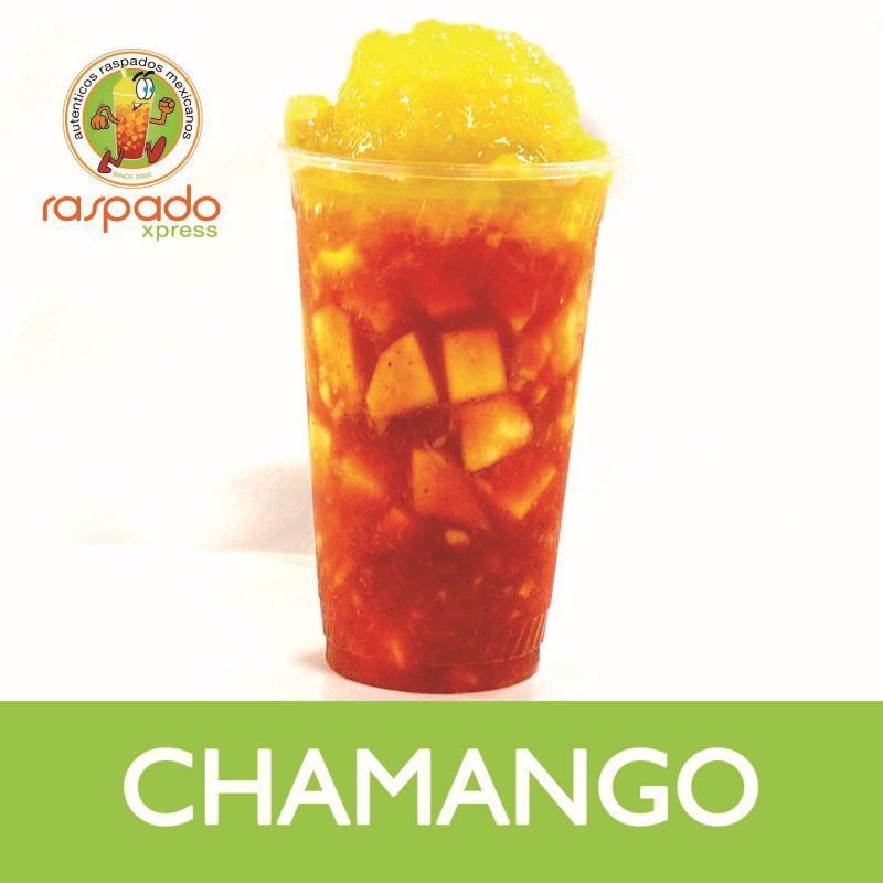 Chamango dessert drink in a clear cup with mango and red sauce.