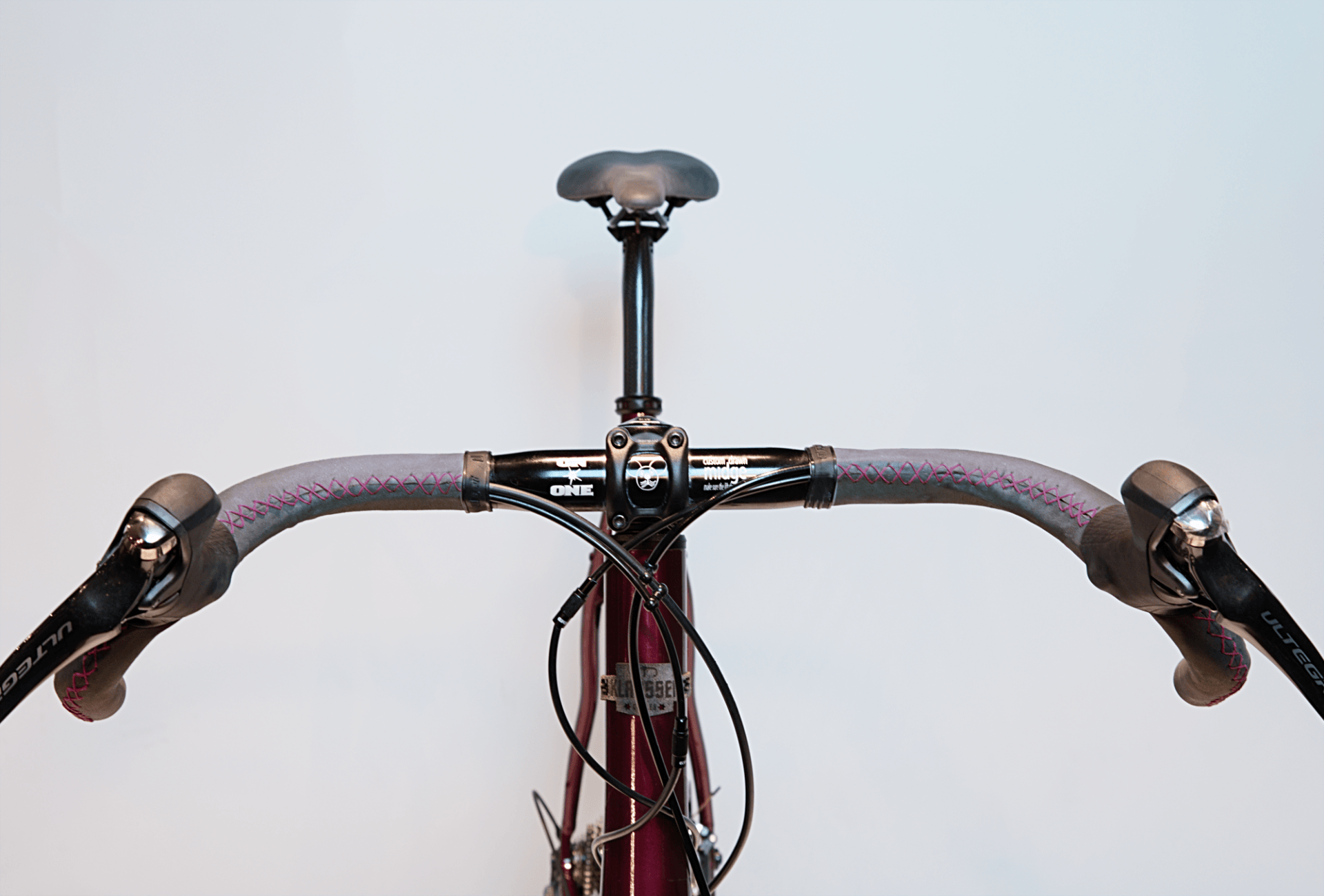 hand sewn LEATHER on HANDLEBAR
