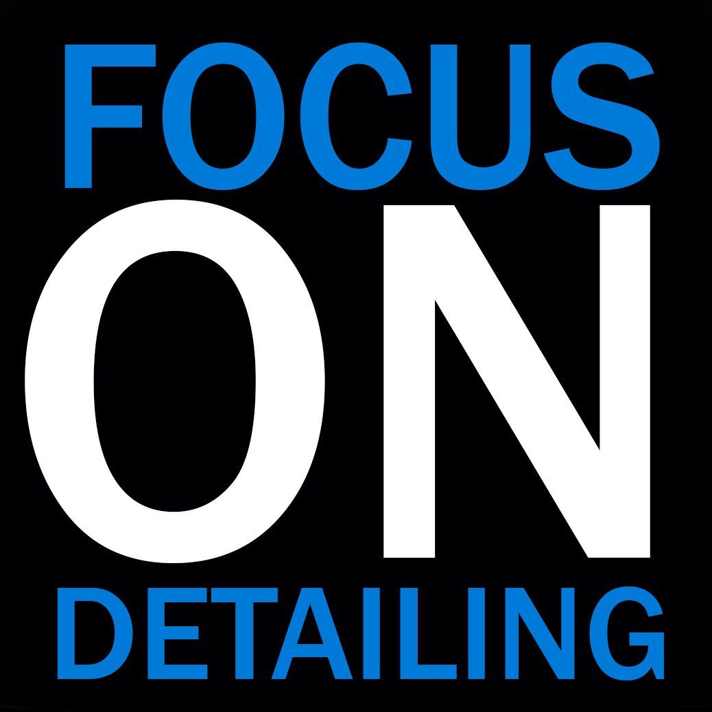 A blue and white logo for focus on detailing