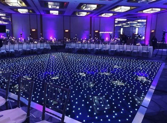 ballroom with party lights and light up dance floor