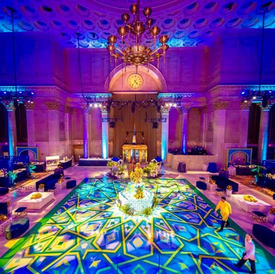 large ballroom with blue purple and green light