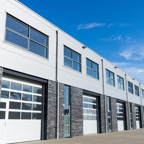 A row of industrial garage doors from GT Automation