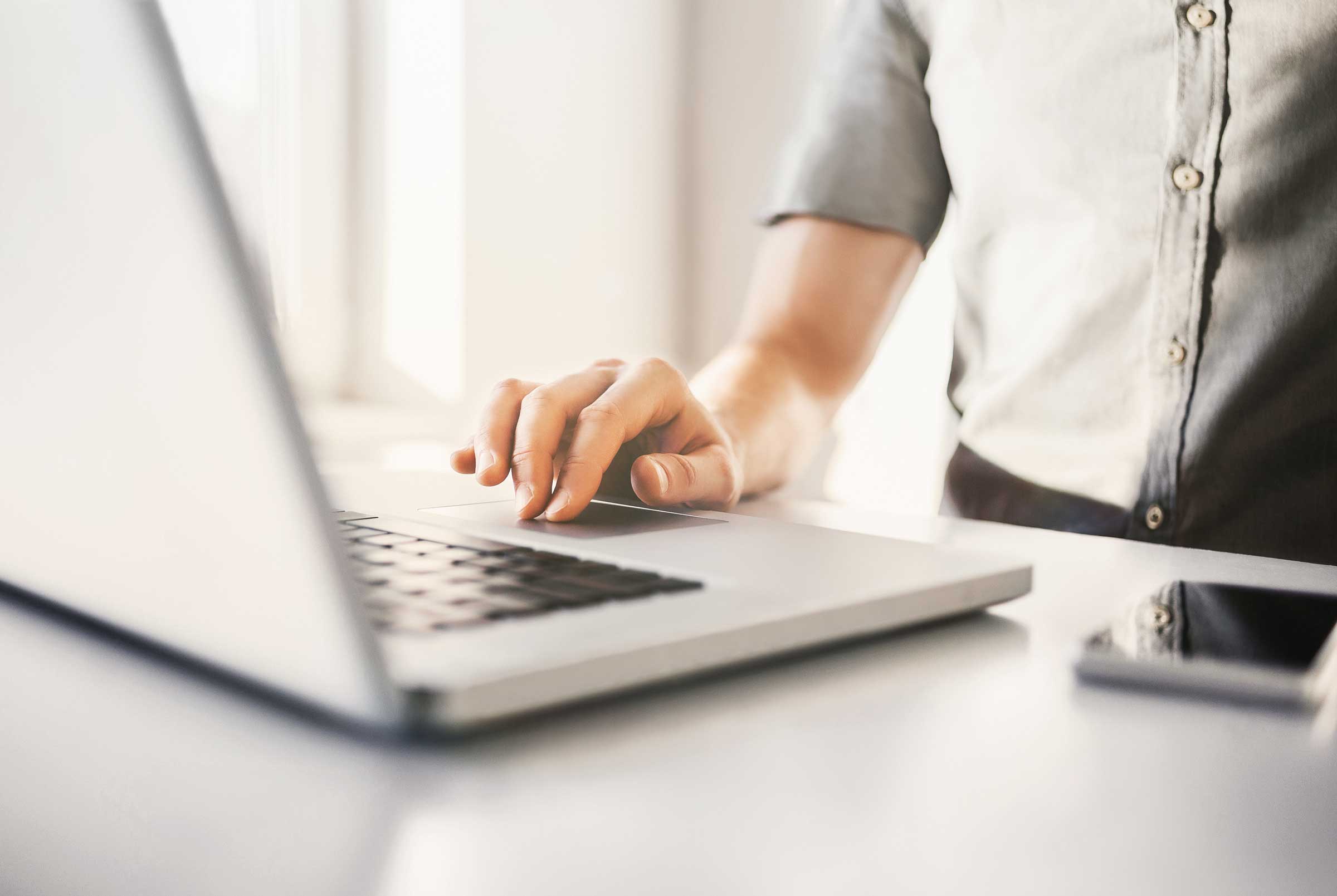 Businessperson working on laptop businessperson working on laptop