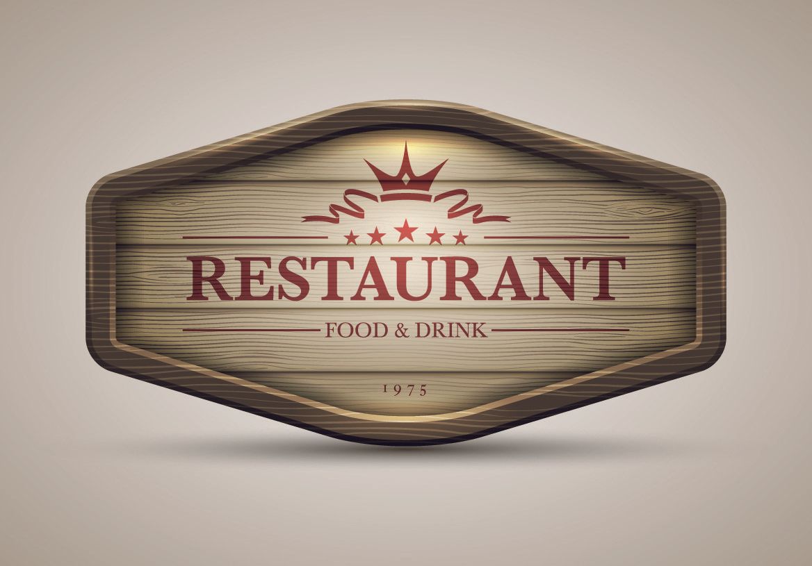 Wooden restaurant sign with crown logo and the word