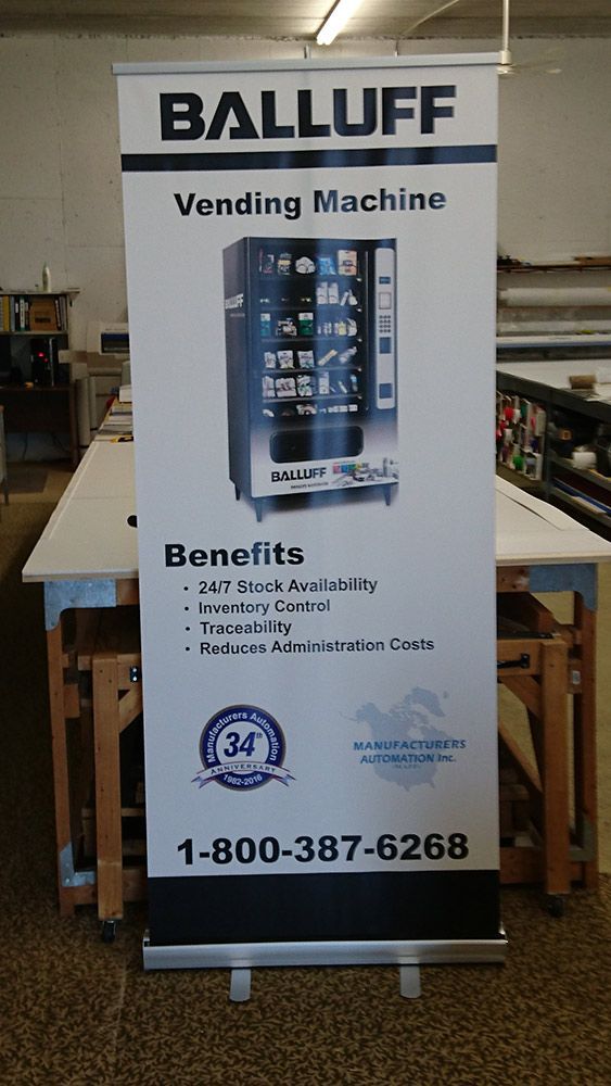 Balluff vending machine banner: dark blue/white, with vending machine graphic, 