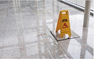 Wet Floor Sign on Lobby - Cleaning in Medford and Grants Pass, OL Wet Floor Sign on Lobby - Cleaning in Medford and Grants Pass, OL