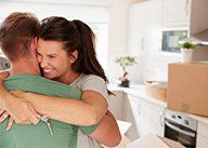 Couple in front of Home, Homeowners Insurance in Middlebury, IN