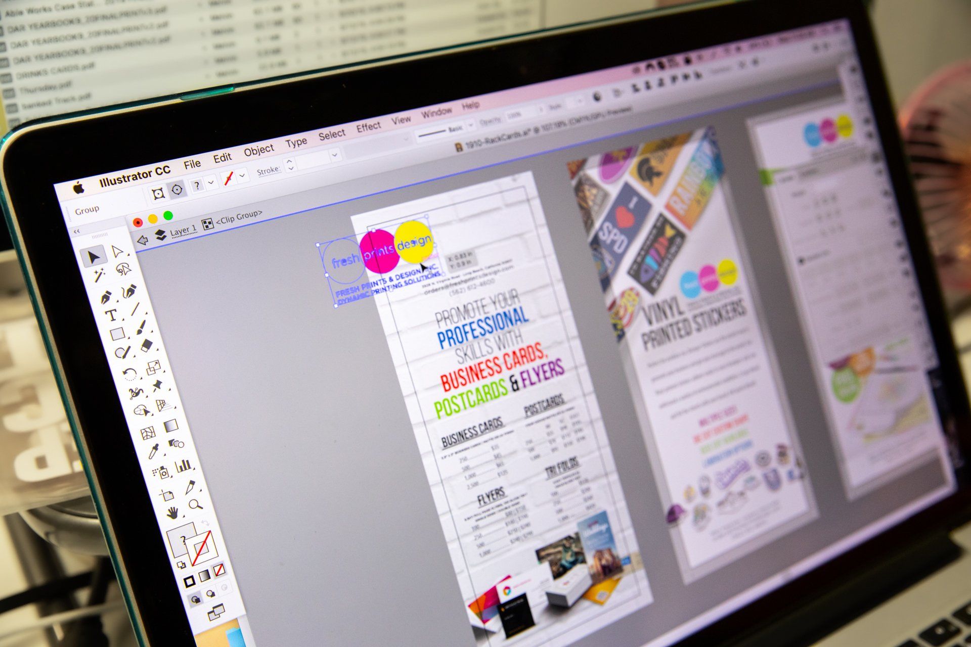 Vector and computer screens with text and logo