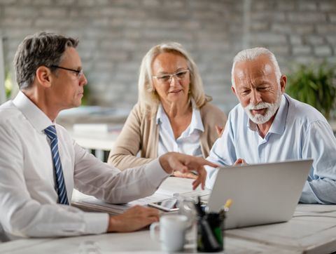 Mature Couple with Insurance Agent — Pontiac, IL — Potter Insurance Agency Mature Couple with Insurance Agent — Pontiac, IL — Potter Insurance Agency
