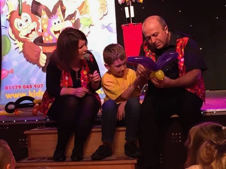 Derek and Suzanne with a little boy
