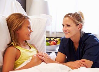 Nurse having a conversation with the child - Home Health in Chadds Ford, PA Nurse having a conversation with the child - Home Health in Chadds Ford, PA