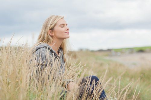 Calm woman in wheat grass calm woman in wheat grass