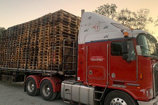truck pulling pallets