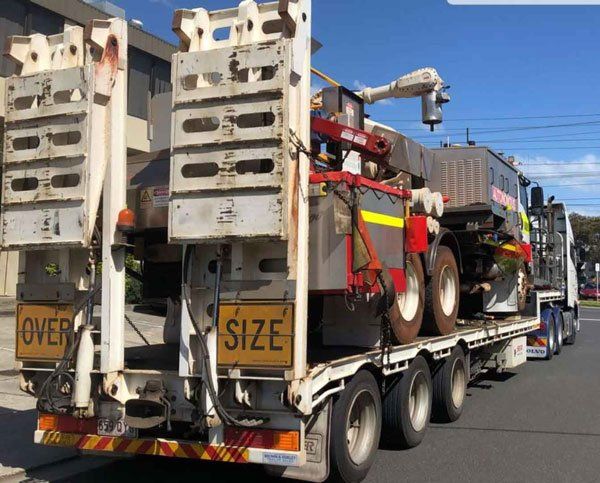 Large utility trailer with large vehicle