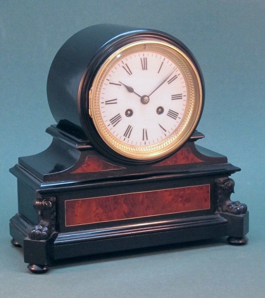 Click image for details Ebonised Drumhead Mantel Clock with Amboyna Panels