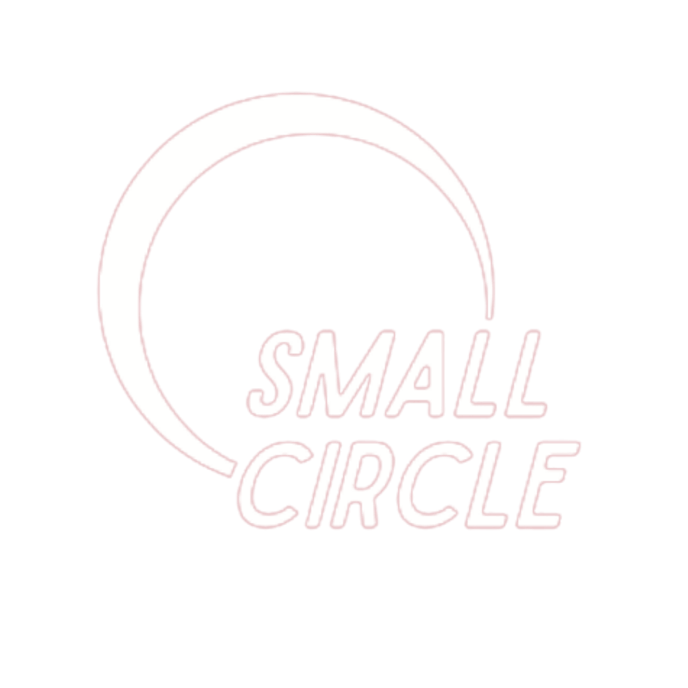 The logo for small circle is a pink circle with the words `` small circle '' written inside of it.