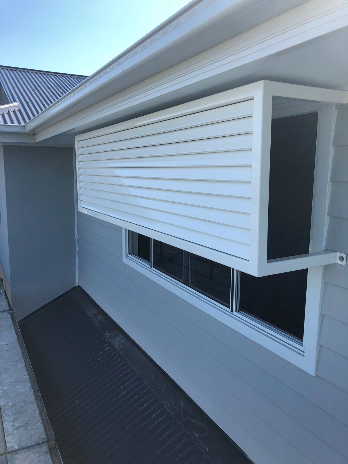 White Privacy Screen Covering the Window