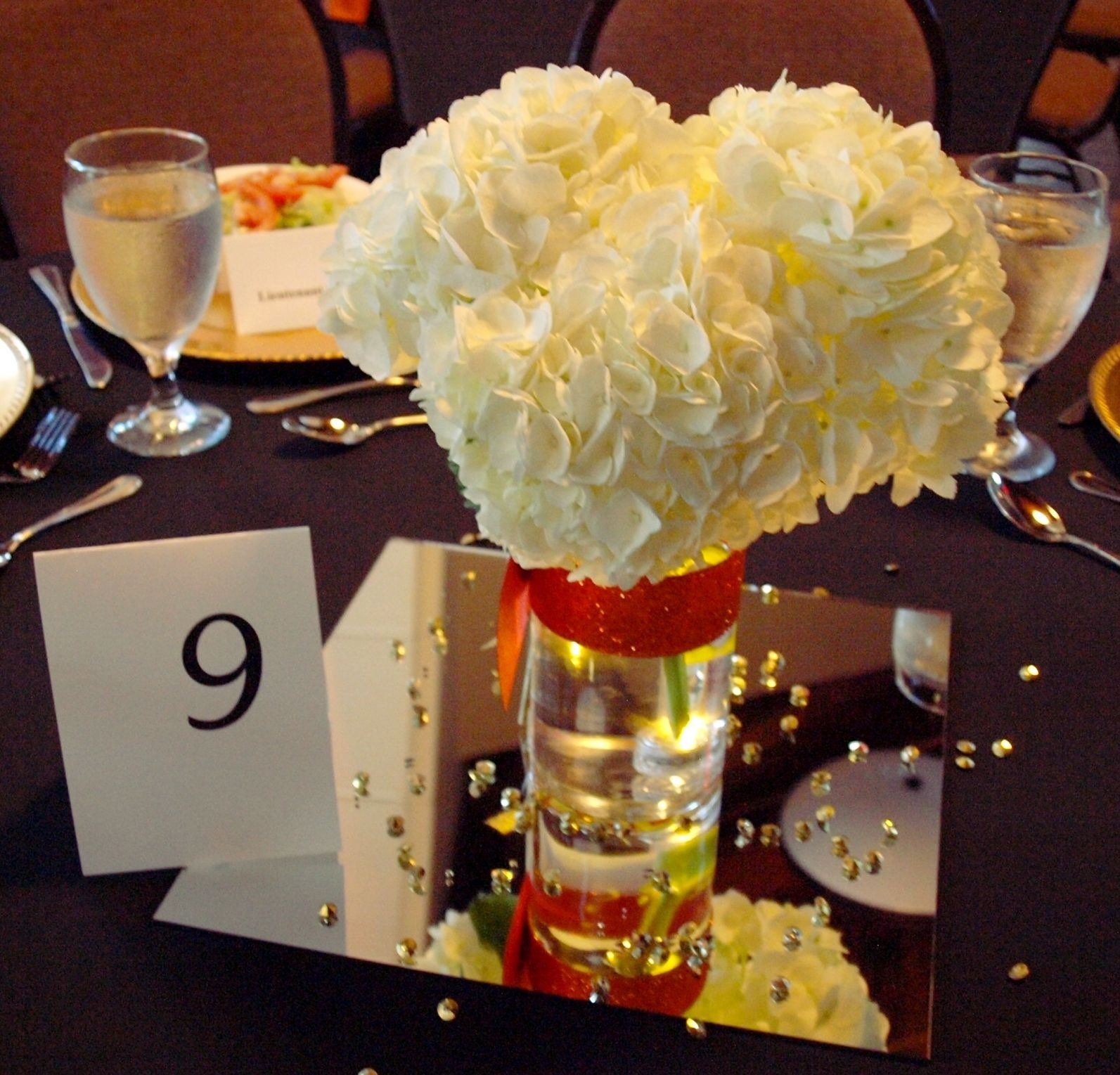 floral centerpiece of white hydrangeas