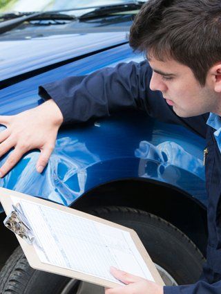 Mechanic Inspecting Damage Car — New Braunfels, TX — Assurance Specialist of Texas Mechanic Inspecting Damage Car — New Braunfels, TX — Assurance Specialist of Texas