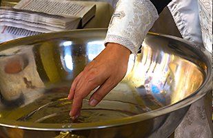 Baptism— Priest in Church in Metairie, LA