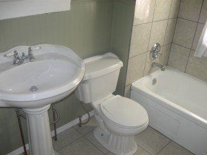 Bathroom with tub in 3308 Webster St, DiBar Enterprises.
