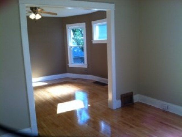 Living space with hardwood floors in 3308 Webster St, DiBar Enterprises.