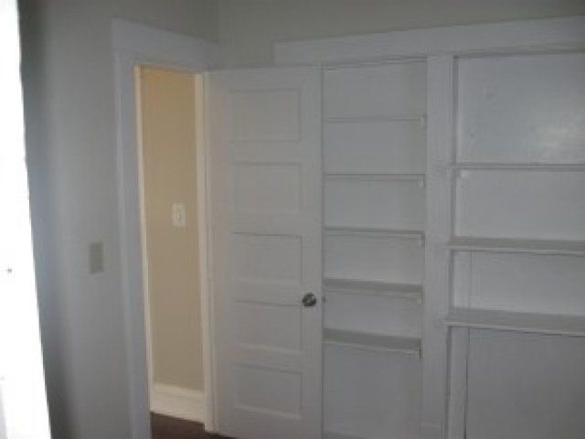 Wooden shelf installation in 3308 Webster St, DiBar Enterprises.